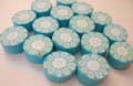 Fashion light blue rubber bead with 6 small flower and a large flower design in the center