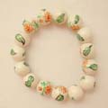 Fashion white Ceramic bead bracelet with orange flowers and green leafs design