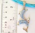 Fashion necklace with multi strings and double playing dolphin with blue cz design