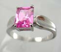Trendy ring with pink cz set in middle, made brass bass and rhodium plated 