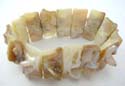 Multi bold rectangular shape dyed seashell forming fashion bracelet with un smooth surface