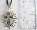 Fashion necklace with black twisted cord string holding a sharp-edge with a cross at center 