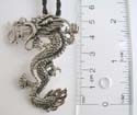 Fashion necklace with black twisted cord string holding a dragon metal pendant at center 