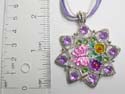 Multi white / purple strings fashion necklace holding pendant with assorted enamel butterfly and flower design at center with 8 rounded purple cz synthetic stone around. Lobster clasp