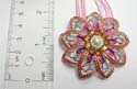 Fashion necklace with multi white / pink strings holding flower pendant in dark orange and purple enamel with multi orange cz around an imitation pearl at center. Lobster claw clasp
