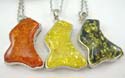 Imitation amber fashion necklace featuring irregular shape amber pendant with lobster clasp. Assorted color randomly pick