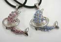 Fashion necklace with black thick cord holding a pendant in dolphin jumping in a hoop design with assorted color cz stone embedded. Silver chain extension with lobster clasp. Randomly pick by warehouse staffs