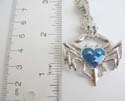 Fashion silver plated necklace holding a crab pendant in blue enamel design. Lobster clasp