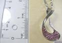 Fashion necklace with lobster clasp and silver plated chain, holding a cut-out twisted oval-shaped pendant with multi mini light purple cz stone embedded on bottom
