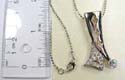 Silver plated fashion necklace holding a triangular-shaped pendant with a clear cz stone on bottom. Lobster clasp