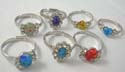 Fashion cz ring in assorted design with clear rounded cz stone around