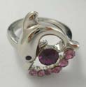 Fashion animal ring in dolphin design holding a rounded purple cz stone at center and mini purple cz on bottom