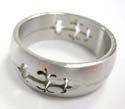 Surgical steel fashion ring with cut-out floral design on two sides