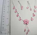 Fashion double pink cat eye beaded chain earrings paired with silver plated necklace holding pink cat eye beads forming flower design and few pearl-shaped cat eye on both sides. Lobster claw clasp