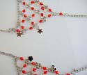 Fashion slave bracelet with multi diamond shape red rhinestones embedded and multi silvery star decor