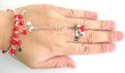 Fashion slave bangle-ring with rounded imitation coral beads embedded and silvery moon, star, or fish bone decor dangling