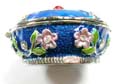 Enamel jewelry box with 5 pinky flower forming a big flower pattern in blue color and mini pink flower inlaid around, magnet lock design