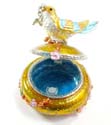Enamel gold jewelry box motif bird figure standed on tree stick holing a cz cherry in a mouth with enamel in gold and blue color