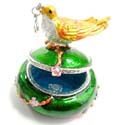 Enamel gold jewelry box motif bird figure standed on tree stick holing a cz cherry in a mouth with enamel in gold and red color