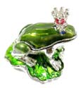 Enamel jewelry box motif frog king figure wearing a red crown rested on porcelain leaf, enamel in green color