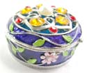 Round enamel jewelry box motif filigree flower holding 5 orange shiny beads and a pearl bead inlaid on lid with pinky flower decor around, enamel in purple color