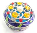 Round enamel jewelry box motif filigree flower holding 5 orange shiny beads and a pearl bead inlaid on lid with pinky flower decor around, enamel in purple color