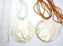 Assorted multi bead strings necklace motif a round shape seashell pendant