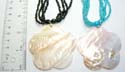 Assorted multi bead strings necklace motif a flower shape seashell pendant