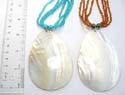 Assorted multi bead strings necklace motif a round shape seashell pendant