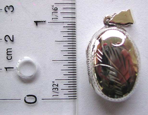 Oval shape sterling silver locket pendant