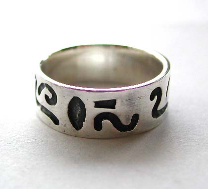 Sterling silver ring in wide band design with black tattoo wave line pattern