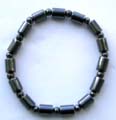 Hematite bracelet, cylinder shape and rounded hematite beades forming strecthy bracelet