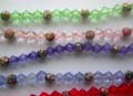 Multi assorted color diamond shape arylic beads forming fashion bracelet with 5 Tibetan flower beads decor along, assorted color randomly pick