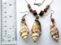 Fashion necklace and earring set with wooden beads chain holding a white-brown spiral seashell pendant