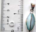 Sterling silver pendant in olive shape design with gloden line central decor, 2 blue mother of pearl seashell inlaid