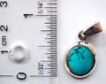 Sterling silver pendant with oval shape genuine blue turquoise stone inlaid