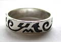 Sterling silver ring with carved-in black tattoo pattern decor