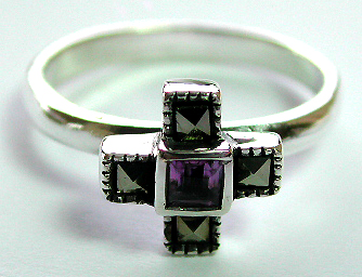 Sterling silver ring with 4 marcasite stone forming cross pattern holding a square shape amethyst stone