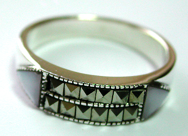Sterling silver ring with e marcasite stones and a triangular white mother of pearl seashell