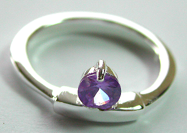 Sterling silver ring with thicker strip central pattern design holding a rounded purple color amethyst stone on top, randomly pick
  