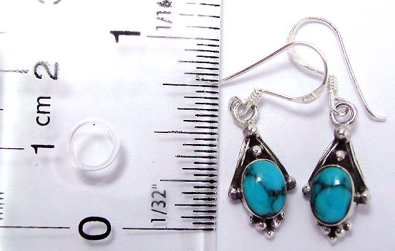 Diamond shape design sterling silver earring with a blue turquoise stone inlaid