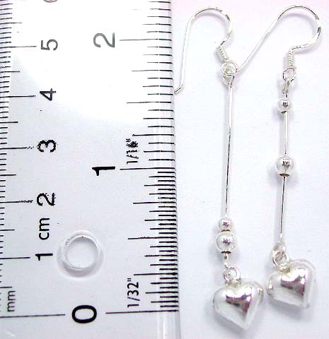 Fish hook sterling silver earring with a beaded long strip holding a heart love pattern on bottom   