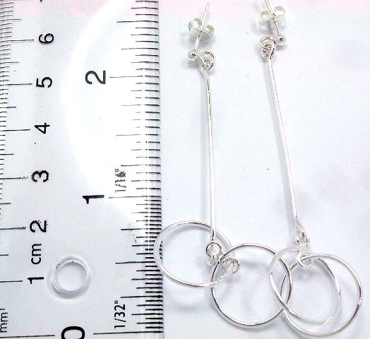 Sterling silver stud earring with long strip holding cross-in double circle pattern on bottom   
