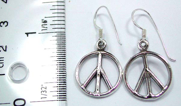 The peace sign symbol sterling silver earring with fish hook back for convenience closure      
