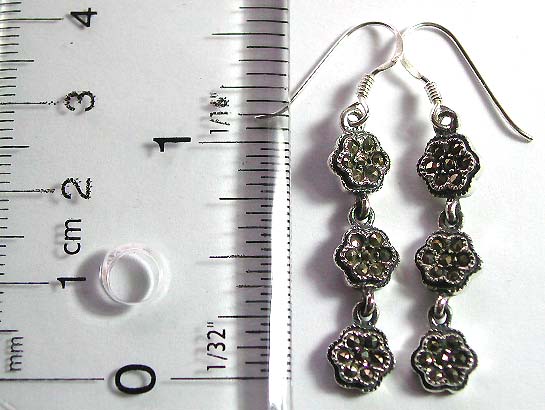 Sterling silver earring with multi marcasite stone embedded triple flower