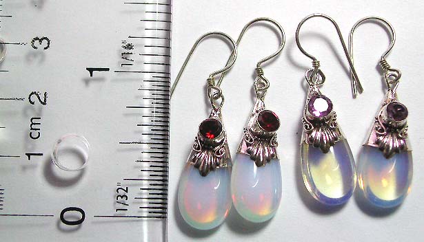 Sterling silver earring with floral pattern and imitation moon stone