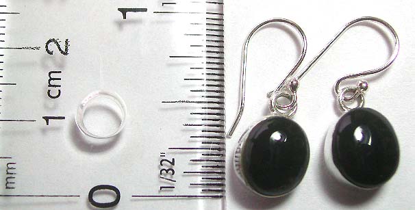 Stamped 925. sterling silver earring with a genuine oval shape black onyx stone