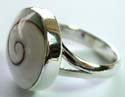 Sterling silver ring with a spiral pattern decor rounded white stone inlay at center