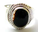 Sterling silver ring with double mini loop pattern holding an oval shape black onyx stone at center