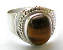 Sterling silver ring with double mini loop pattern holding a genuine oval shape tiger eye stone at center